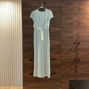 White pants jumper with sash